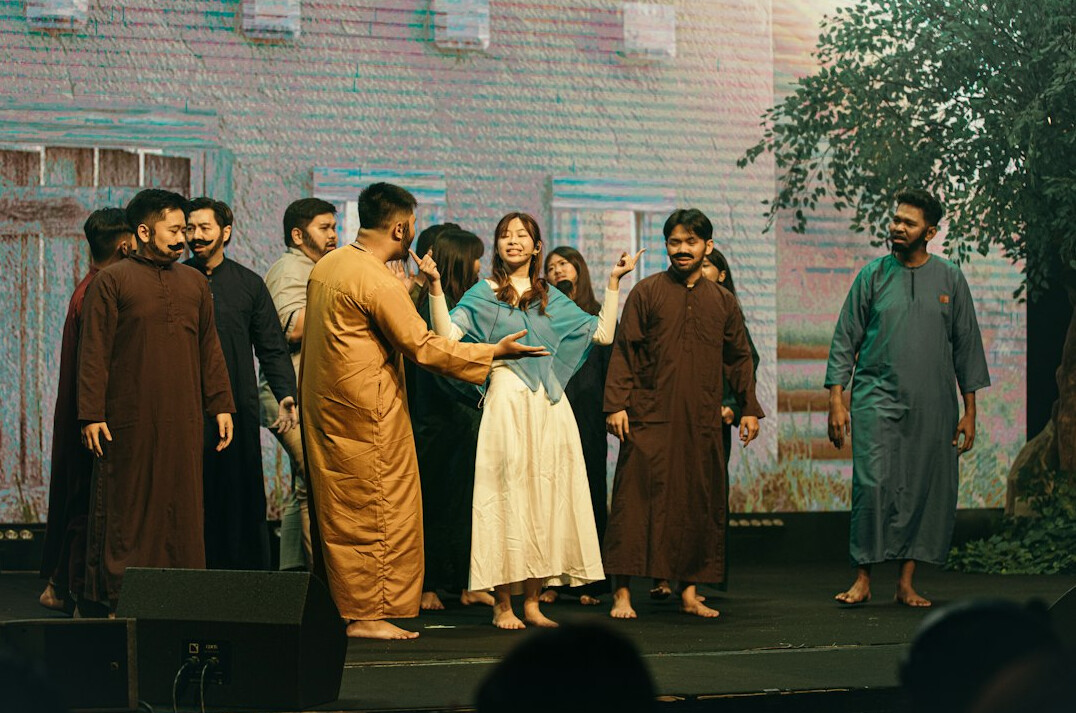 group of actors on stage